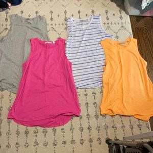 4 Athleta tanks size large sold as bundle